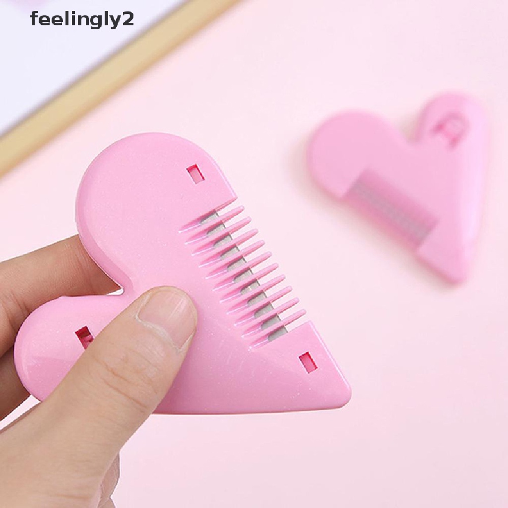 Lược Cắt Tóc Mini Màu Hồng Hình Trái Tim Kèm Lưỡi Cắt Tiện Dụng