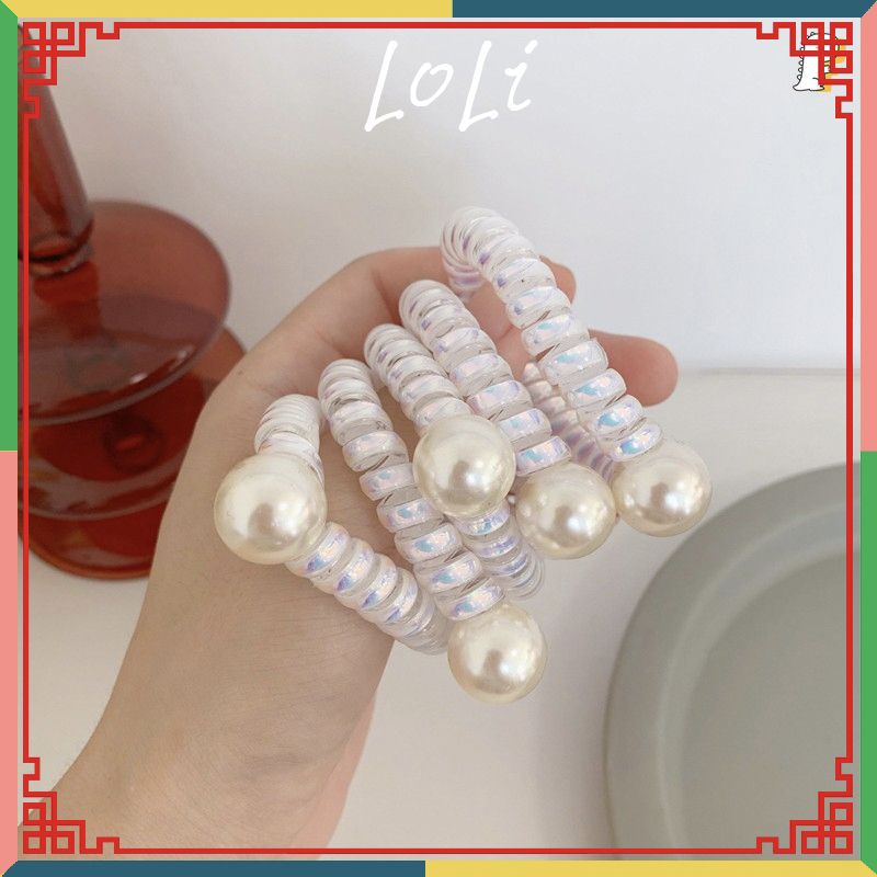 [Mã FAMARAL1 giảm 10K đơn 50K]Dây cột tóc lò xo Hologram đính hạt ngọc xinh xắn