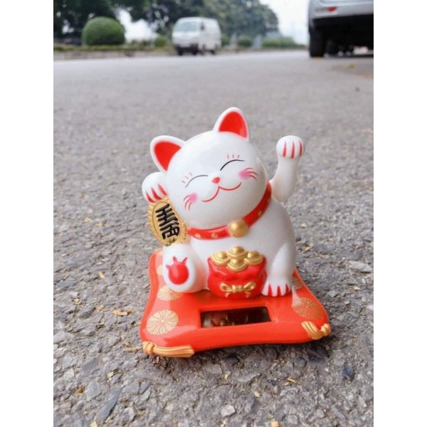 MÈO THẦN TÀI VẪY TAY