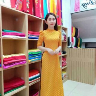 Áo dài chấm bi vàng