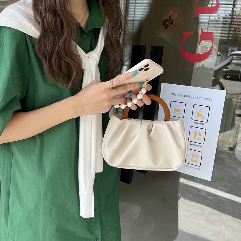 Túi xách nữ cầm tay hoặc đeo chéo quai gỗ phong cách Hàn Quốc.