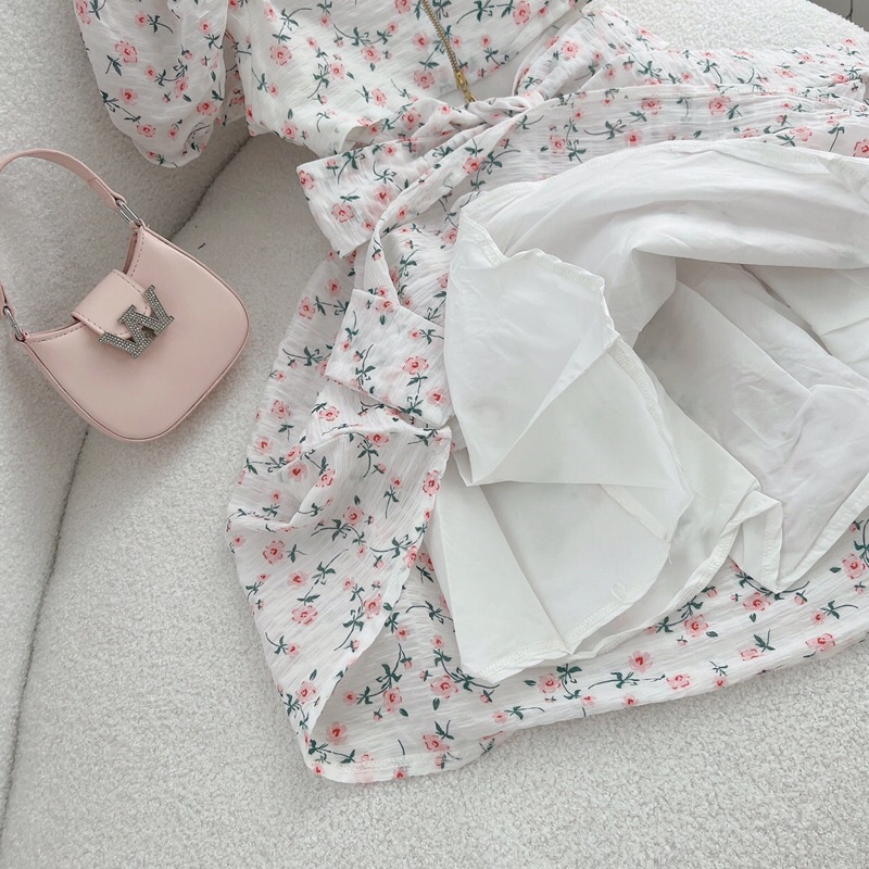 Đầm hoa nhíu xếp ngực nơ lưng cutout
