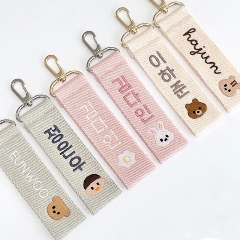 Nametag, móc khoá thêu tên bé mới