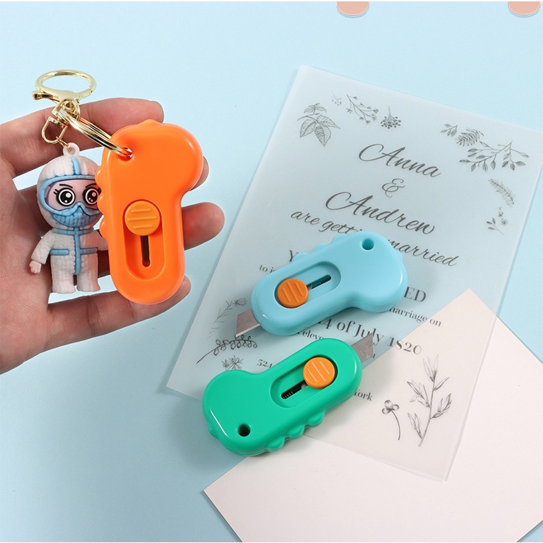GG Dao Rọc Giấy Hình Khủng Long Dễ Thương Nhỏ Gọn Dễ Sử Dụng - Dumi Shop