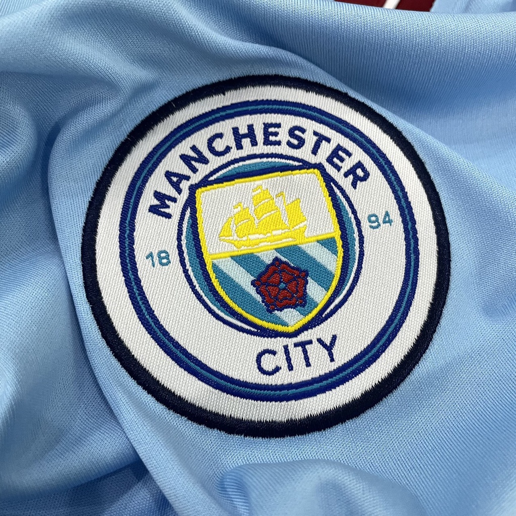 Bộ quần áo đá banh MC Xanh sân nhà tay ngắn FLG NoRoom 2023