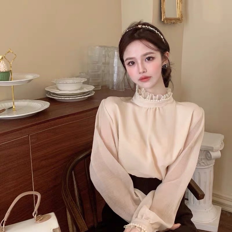 Áo Sơ Mi Voan Tơ Cổ Ngọc Tay Bo Cúc Ngọc Màu Be Sang Chảnh Mặc Trong Áo Tweed Đơn Giản Style Korea Cho Nữ