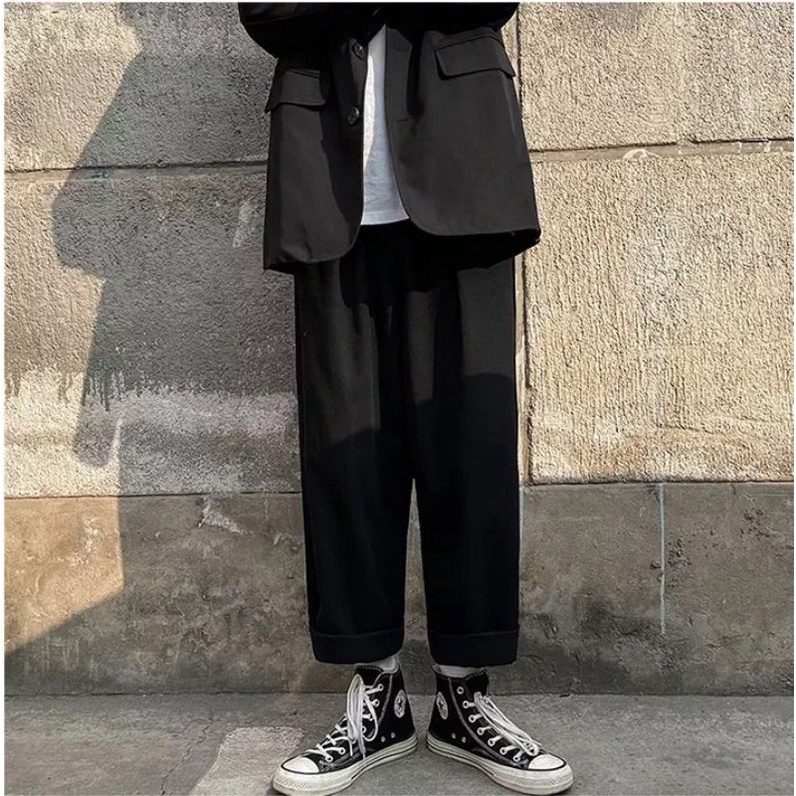 QUẦN KAKI ỐNG RỘNG -TAN -DÁNG SUÔNG PHONG CÁCH HÀN QUỐC-QT1-THỜI TRANG UNISEX-có size Nam Nữ dể phối đồ siêu đẹp màu đen