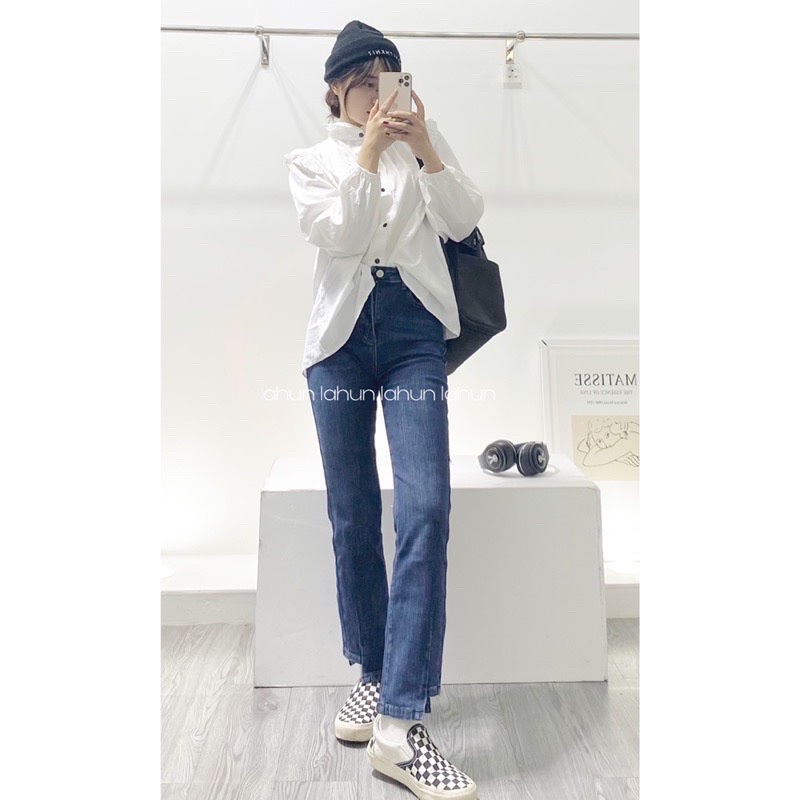 Quần jeans suông gấu lệch cạp cao co dãn