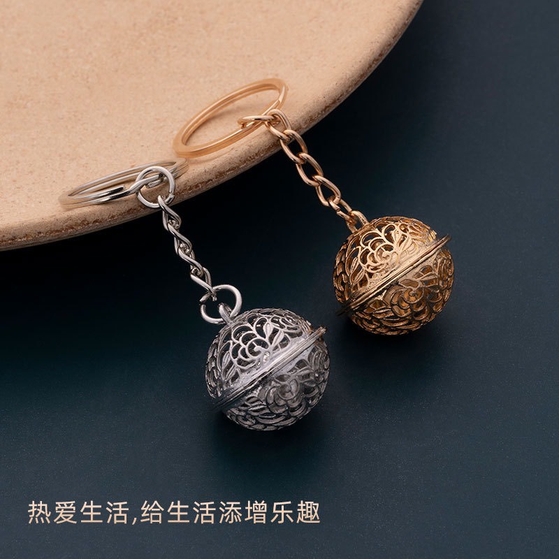 Móc khóa lục lạc chất liệu kim loại