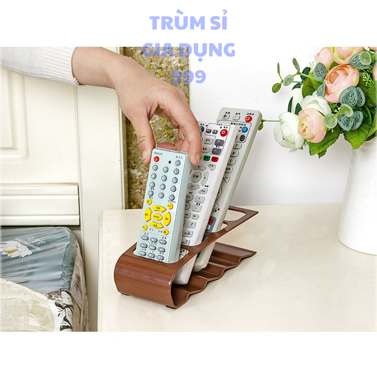 giá để điều khiển remot  tivi điều hòa bằng nhựa 4 trong 1