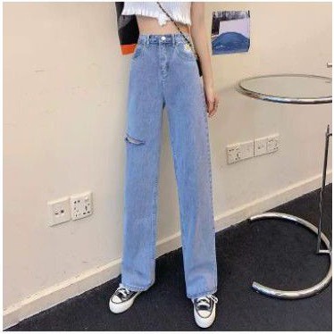 Quần jeans thêu hoa cúc