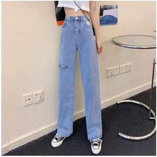 Quần jeans thêu hoa cúc