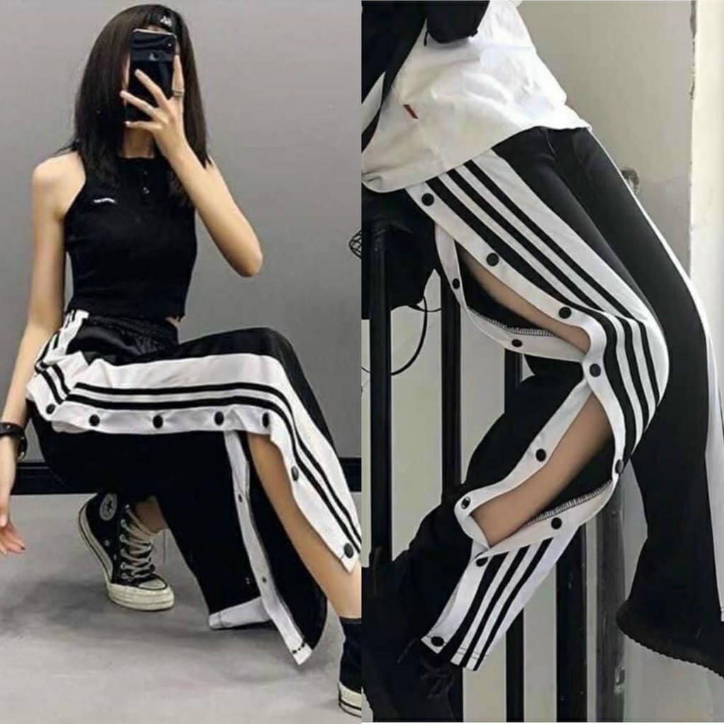 [Mã 11FASHIONSALE1 giảm 10K đơn 50K] FREESHIP 50K - Quần Thun Ống Rộng Chạy Viền Xẻ Tà Nút Bấm