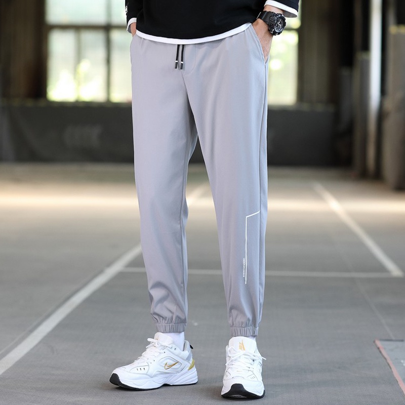Quần jogger thể thao màu trơn chất gió dù mềm mịn in họa tiết phong cách Hàn Quốc cho nam quần gió nam