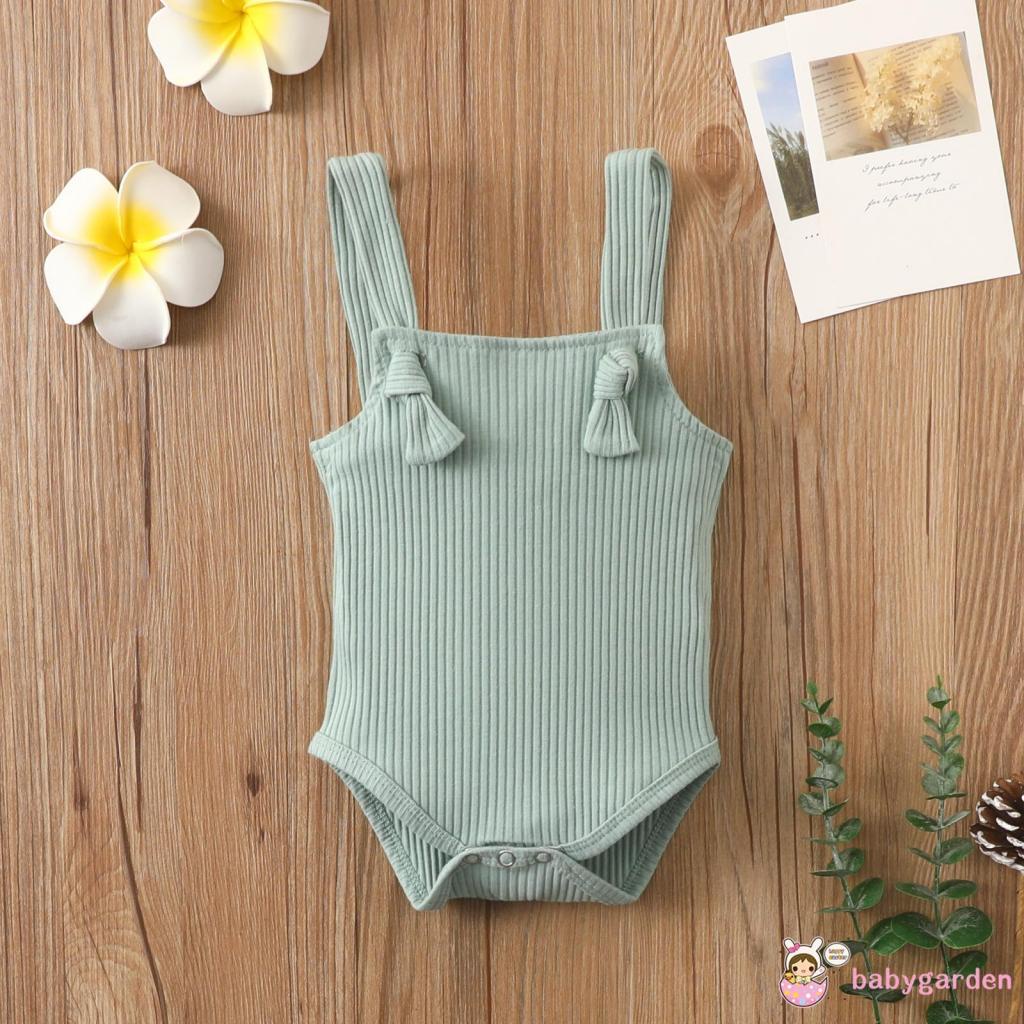 Áo liền quần có dây và nút màu trơn chỉnh được cho bé gái 0-24 tháng