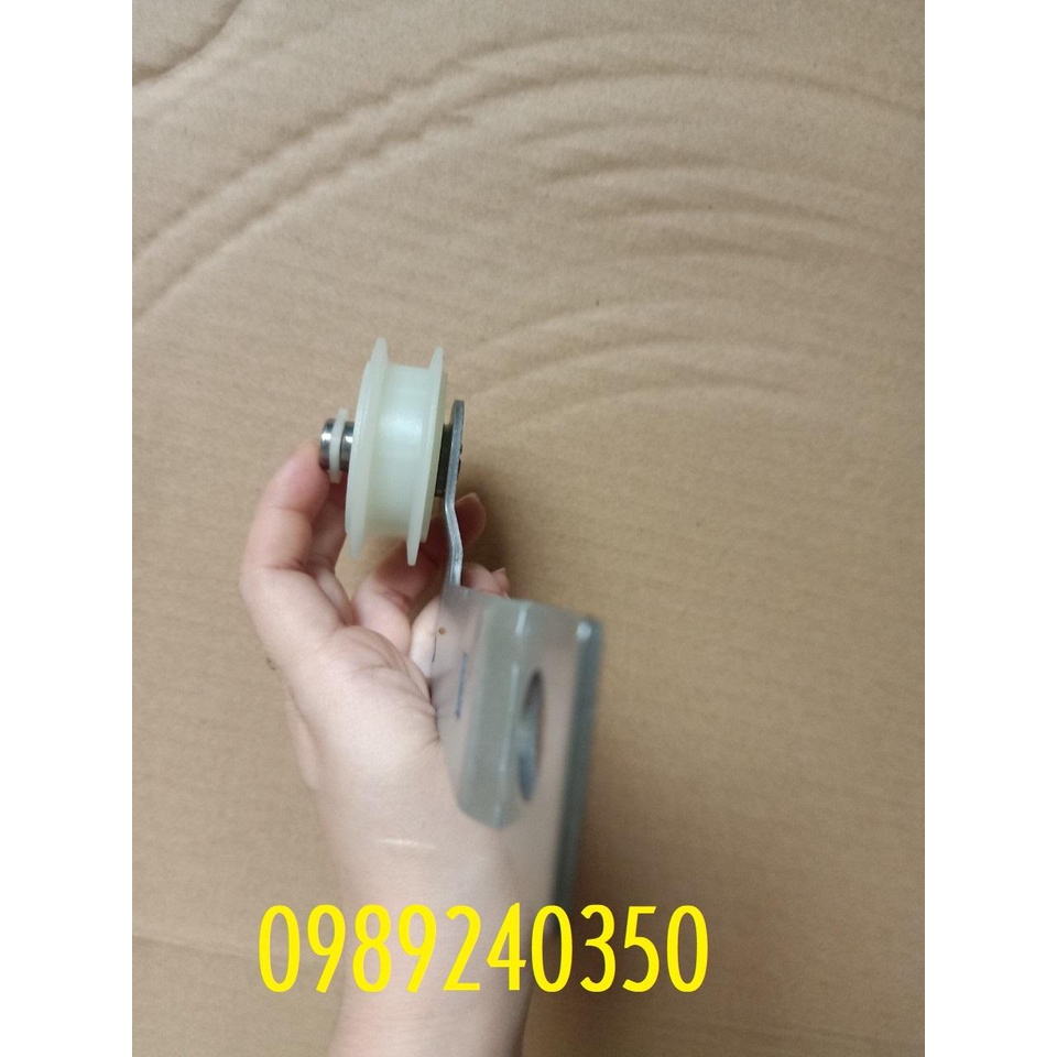 Bánh tỳ căng dây curoa máy sấy Whirlpool