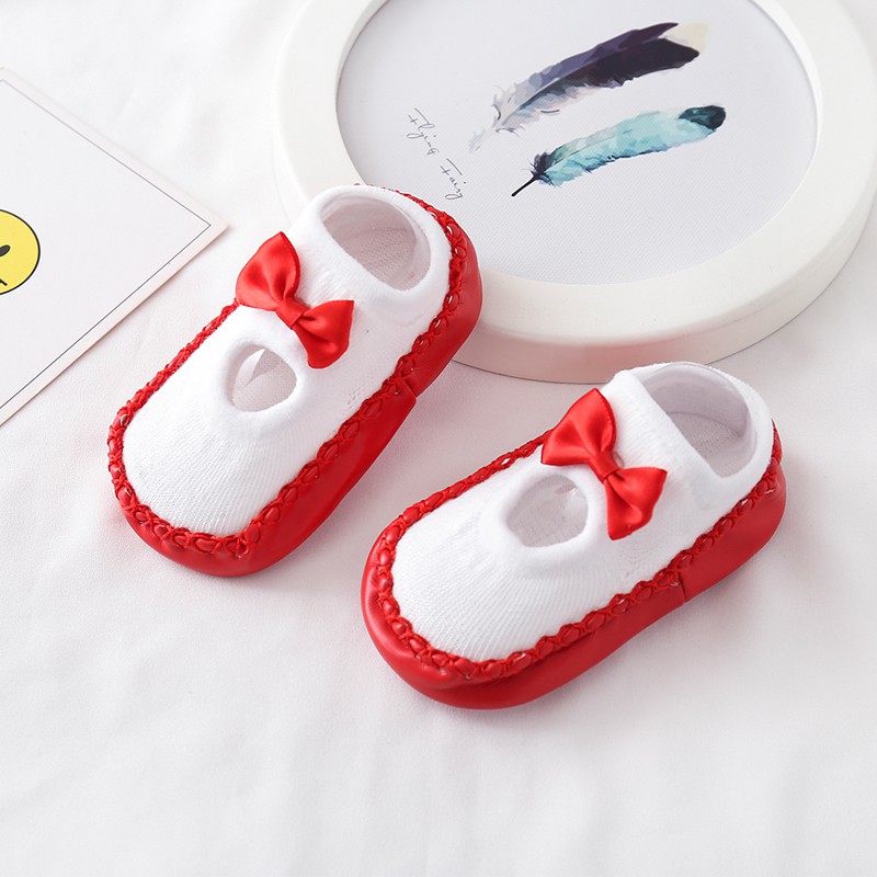 Đôi vớ cotton đính nơ giữ ấm chống trượt cho bé gái sơ sinh