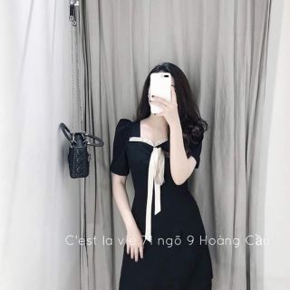 Váy đen nơ ngực