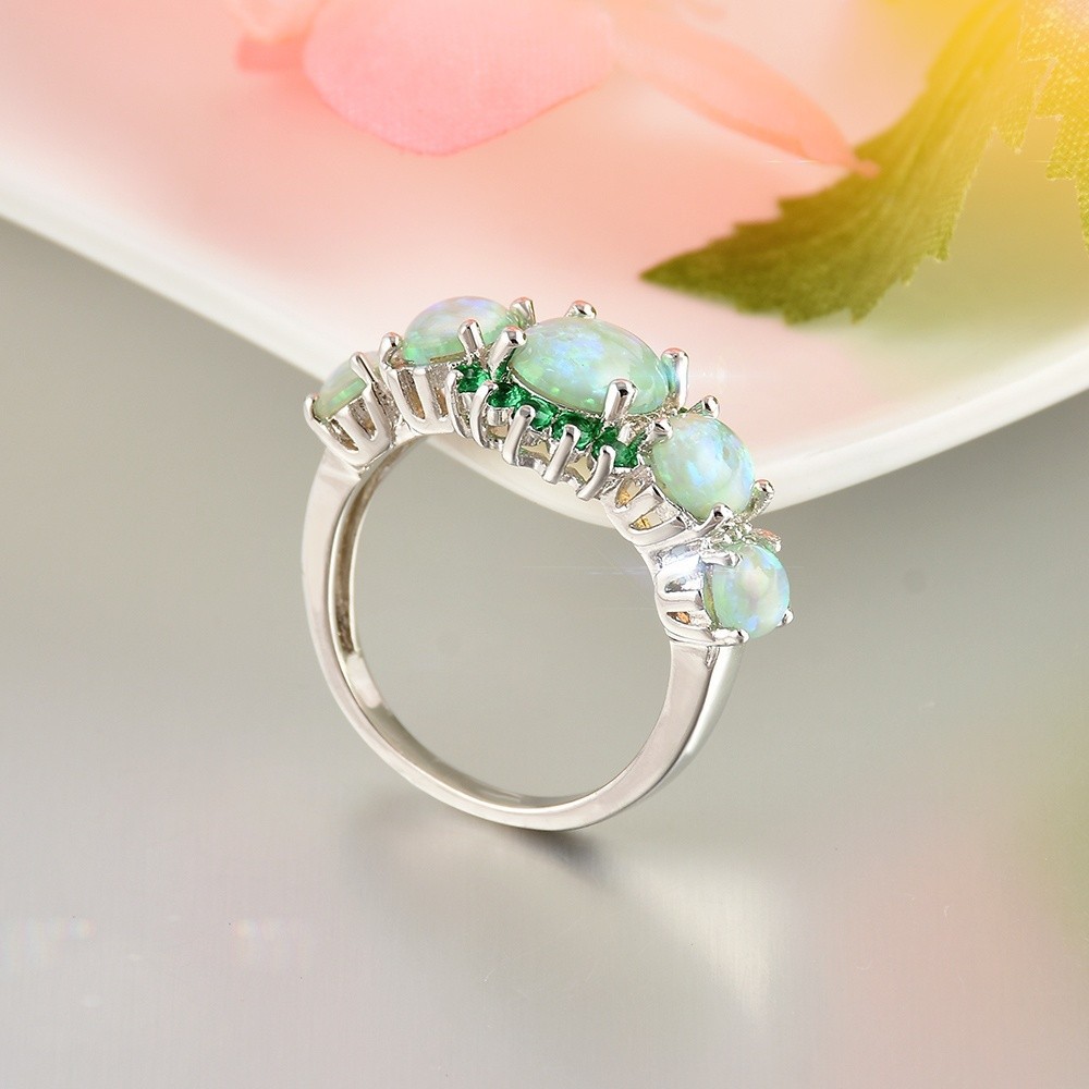 Nhẫn mặt gắn đá opal màu xanh thiết kế đơn giản sang trọng