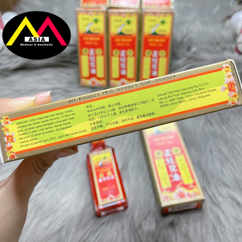 Dầu nóng Hồng Hoa hiệu cây búa , dầu gió giảm đau cơ lưng thấp khớp chuột rút bong gân bầm tím massage singapore 32ml