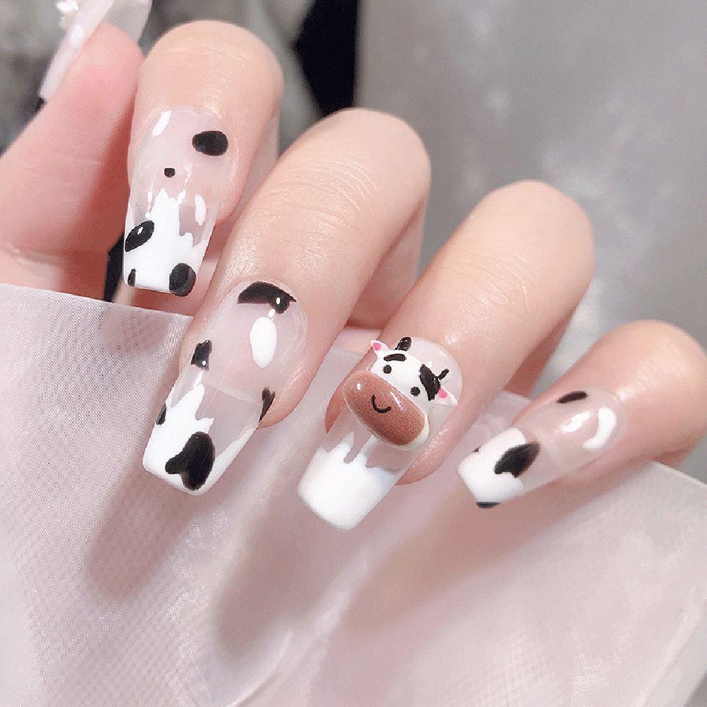 Charm nail bò sữa cute cho chị em trang trí móng xinh