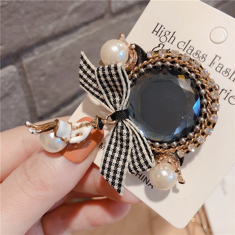 Trâm cài áo hình nơ đính ngọc trai sang trọng