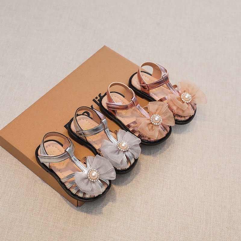 Sandal tập đi cho bé gái - dép rọ quai hậu cho bé bảo về chân nơ lưới bánh bèo điệu đà quai dán đế dẻo BabyBees A11