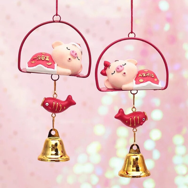 Chuông gió lợn thần tài