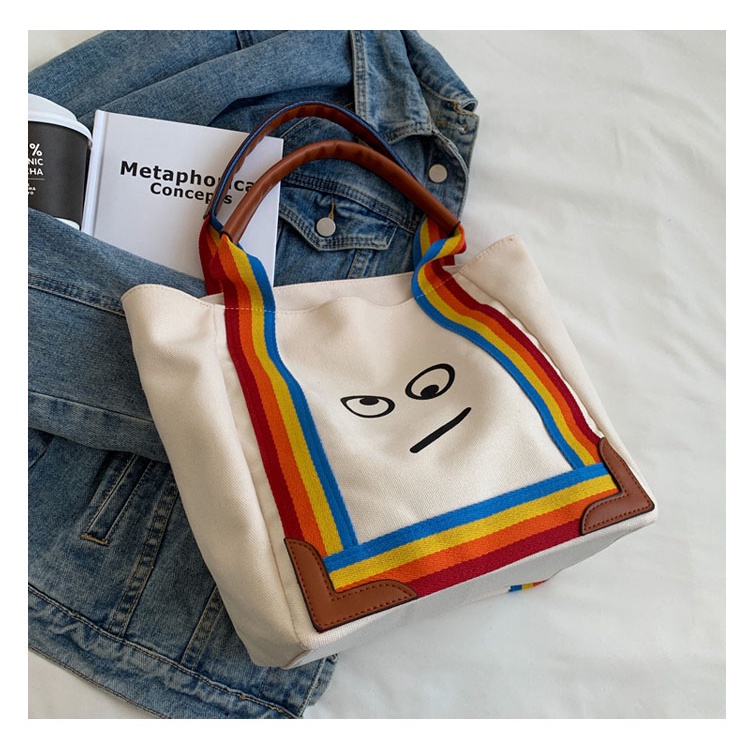 Túi xách mặt cười quai dài