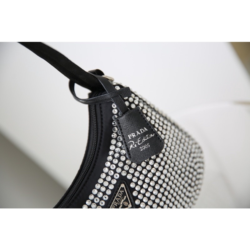 Túi Xách P RA DA Đá gắn cả 2 mặt ,tag da in