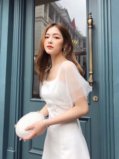 Đầm trắng phối lưới tinh khiết