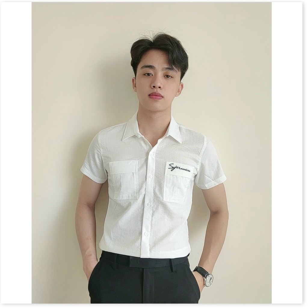 ÁO SƠ MI ĐŨI TAY NGẮN,THIẾT KẾ HỌA TIẾT TRƠN NHƯNG KHÔNG KÉM PHẦN SANG TRỌNG,ĐẶC BIỆT LÀ CHẤT LIỆU VÃI THOÁNG MÁT VÀ MỊM