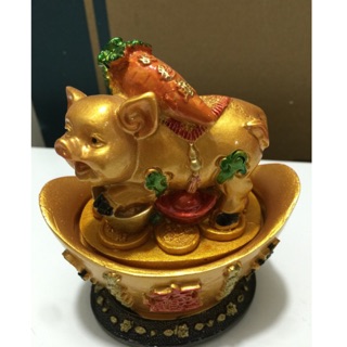 Heo ngồi thỏi vàng