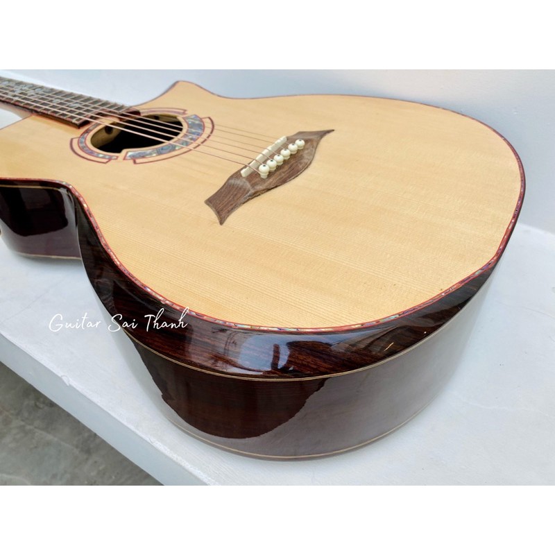 Đàn guitar custom cẩm ấn khảm xà cừ có lắp EQ