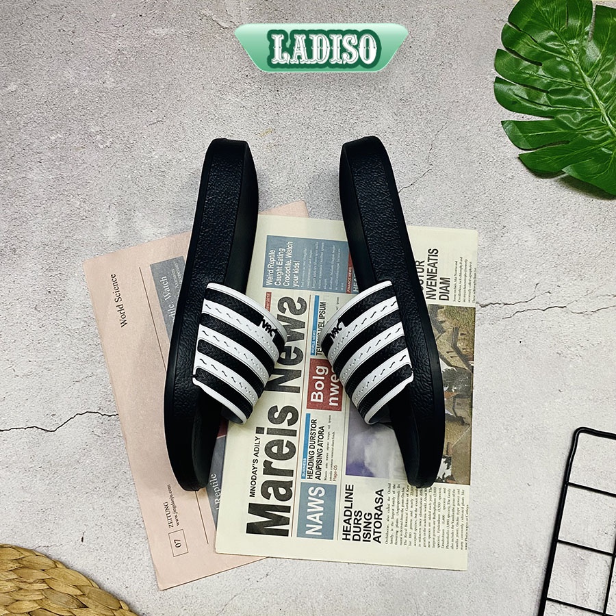 Dép nam quai ngang sọc đen trắng siêu hot chất liệu cao cấp siêu nhẹ siêu êm đi cực kì thoải mái TT395