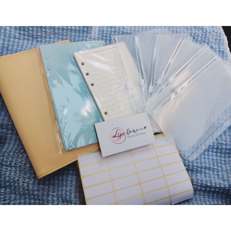 Sổ lên kế hoạch thu chi bìa còng có ngăn tiết kiệm A5 và A6