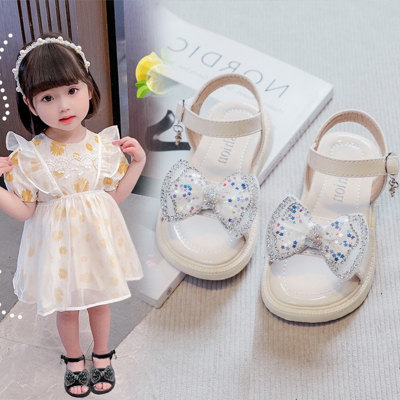 Sandal đính nơ kèm vương miện cho bé gái mẫu hot 2022 - Hàng Quảng Châu Cao Cấp (K62)