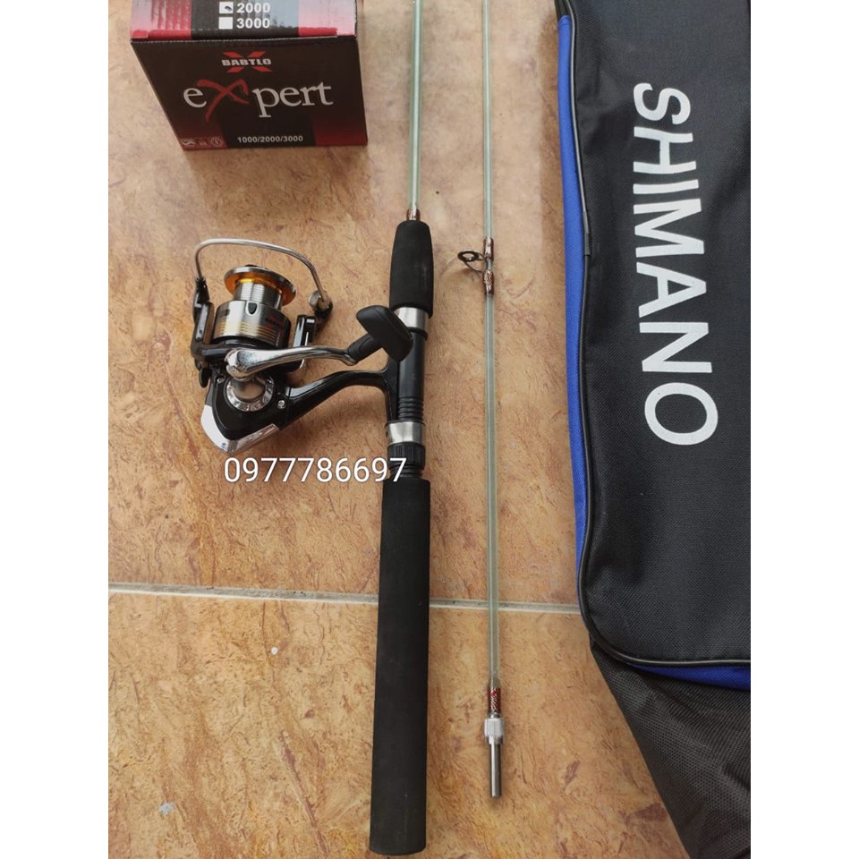 Combo cần 2 khúc đặc trong suốt,máy expert và túi đựng shimano