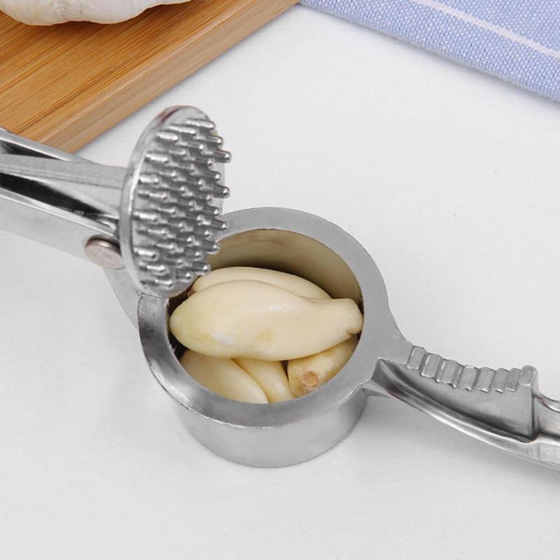 Dụng cụ ép tỏi cầm tay tiện dụng