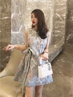 Đầm xoè họa tiết cột nơ eo