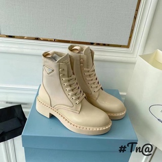 Boot da prada đan dây mai phương bùi