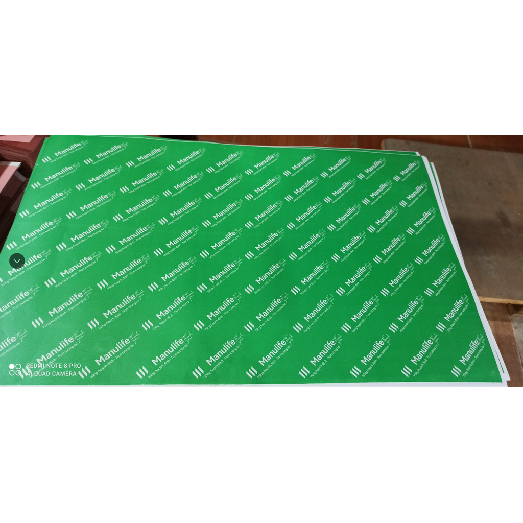 Giấy gói quà logo manulife màu xanh kích thước 52x72cm. Gói siêu đẹp