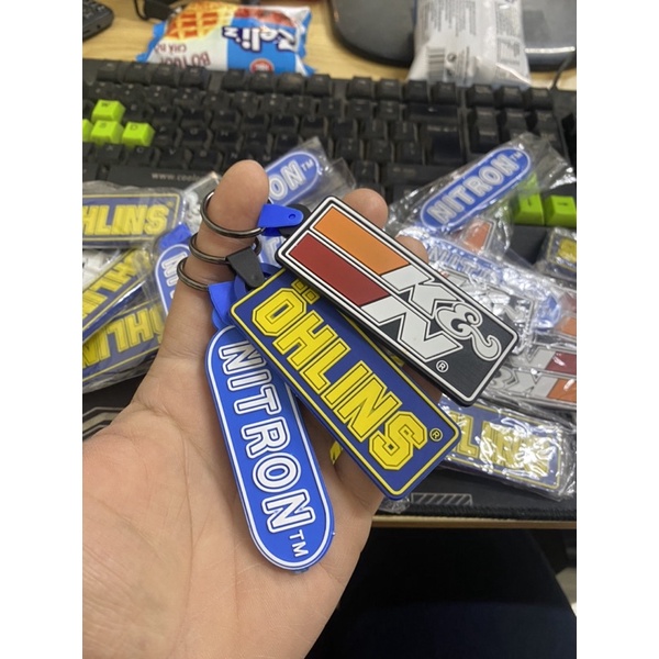 Móc thìa khoá cao su hình Nitron, K&amp;N, Ohlins. Có khớp xoay chống đứt