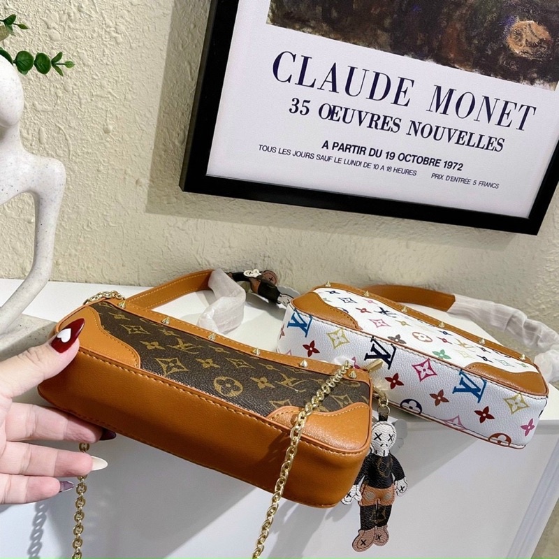 Túi kẹp nách phối đinh tán tặng kèm móc hề