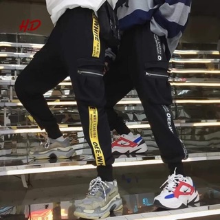 Quần off white khoá túi