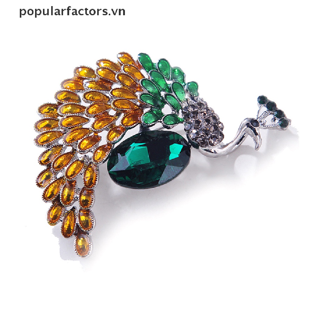 Ghim cài áo hình con công phong cách Giáng sinh đính hạt đá