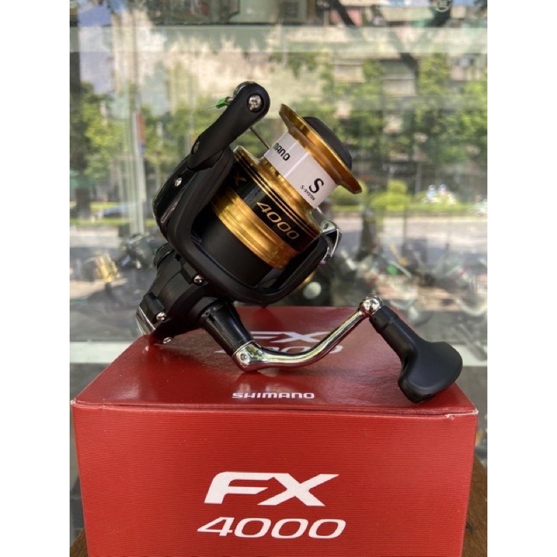 máy câu cá FX 4000 shimano hàng chính hãng máy tải cá lên 10kg y hình máy quay rất êm giá rẻ 9kka5rbal