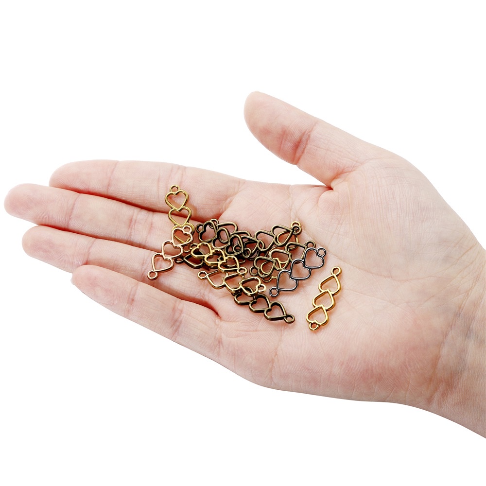 Set 30 mặt dây chuyền ST.KUNKKA thiết kế hình trái tim rỗng thời trang đơn giản