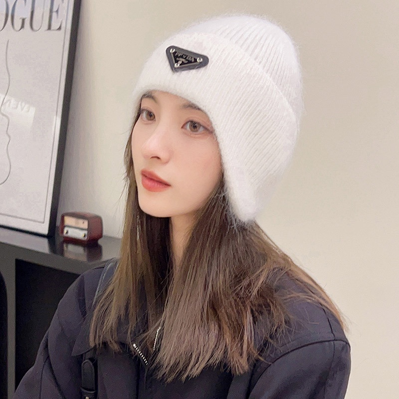 Mũ bảo vệ tai ấm áp của phụ nữ nam giới yêu thích nhãn tam giác mùa thu và mùa đông gió và bảo vệ lạnh áo pull dệt kim đi xe đạp ngoài trời boutique mũ len lông thỏ