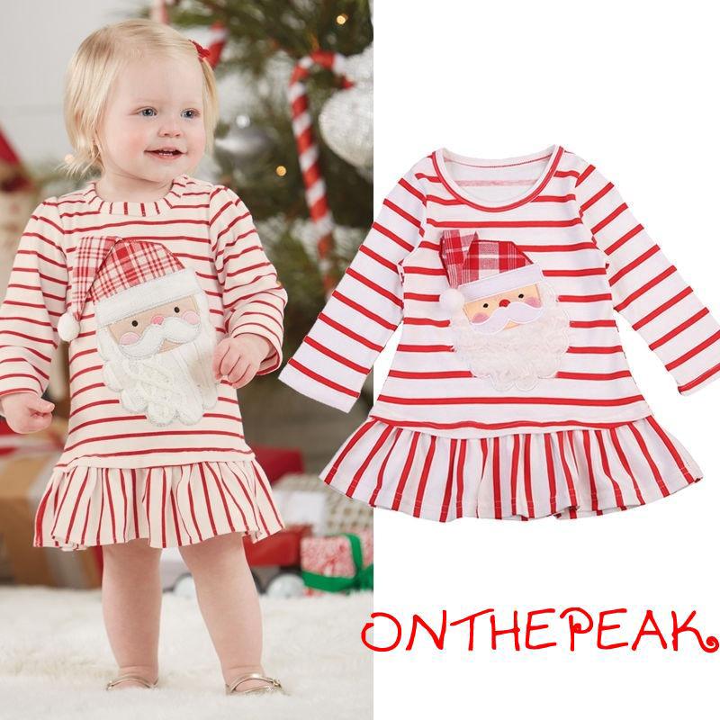 Đầm thun tay dài họa tiết ông già noel dành cho bé gái 6 tháng đến 5 tuổi